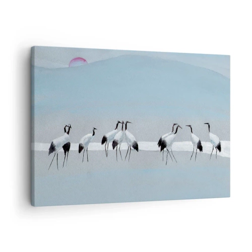 Impression sur toile - Image sur toile - Un groupe de grues contre un ciel bleu et le soleil levant - 70x50cm - Après une chaude journée - Décoration murale moderne pour le salon et la chambre ARTTOR