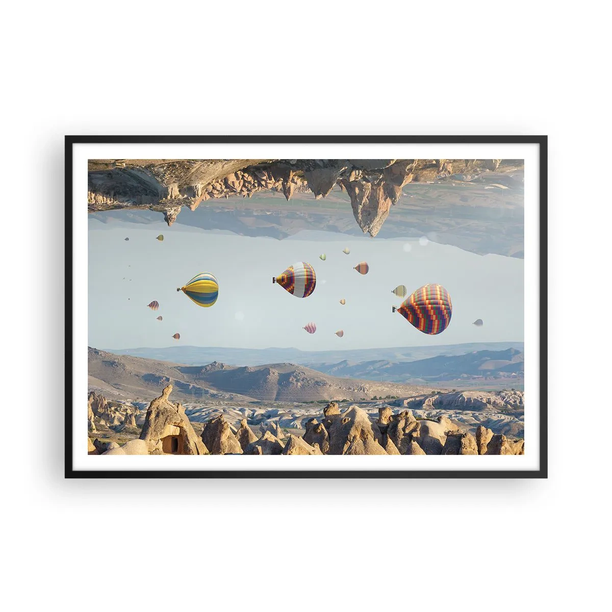 Affiche dans un cadre noir - Poster - Ballons colorés au-dessus d'un paysage rocheux - 100x70cm - Ici, tout est possible - Décoration murale moderne pour le salon et la chambre ARTTOR