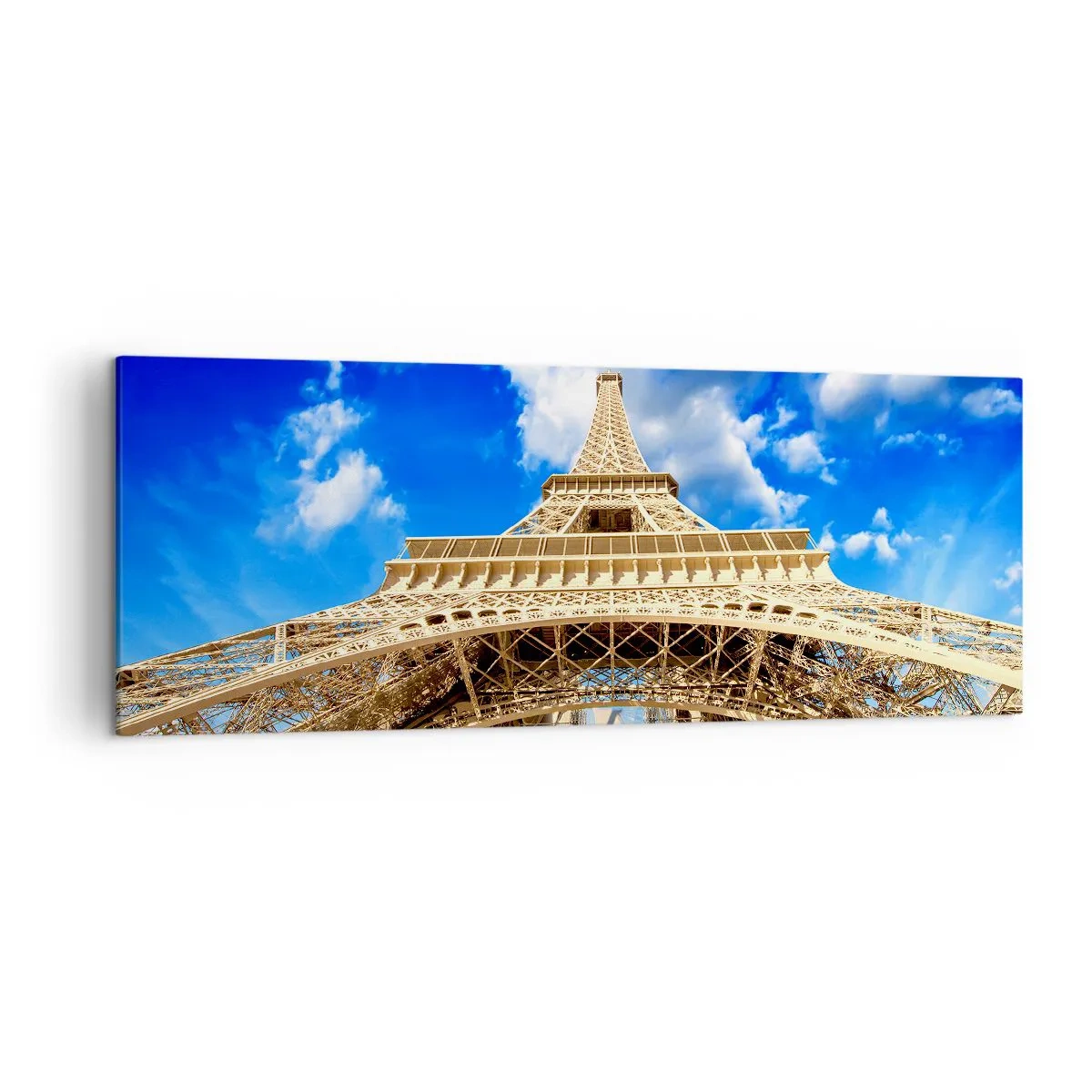 Impression sur toile - Image sur toile - La Tour Eiffel vue d'en bas contre un ciel bleu - 140x50cm - Atteindre le ciel et les nuages - Décoration murale moderne pour le salon et la chambre ARTTOR