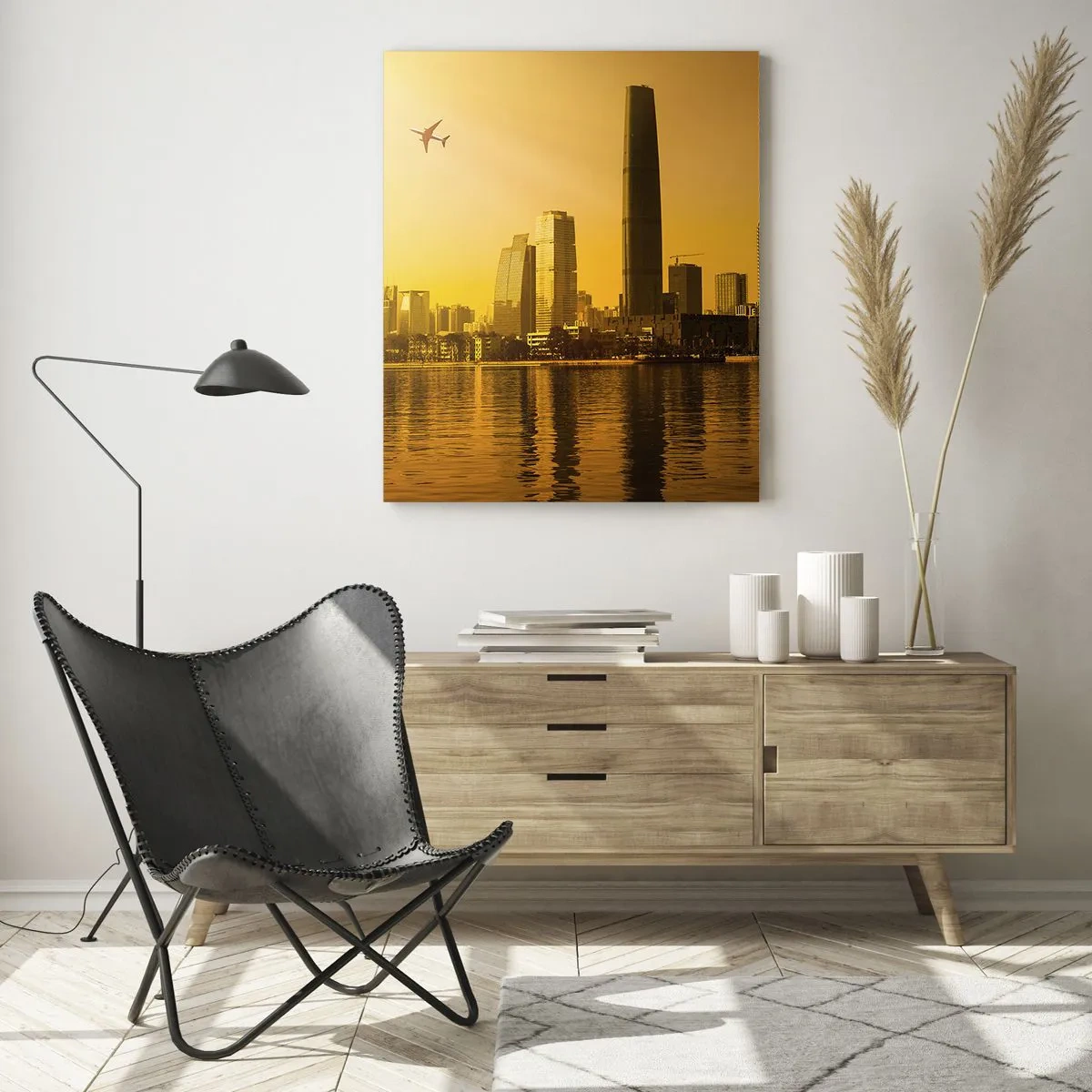 Impression sur verre - Image sur verre - Panorama de la ville au coucher du soleil avec des gratte-ciels et un avion - 70x100cm - La ville en or - Décoration murale moderne pour le salon et la chambre ARTTOR
