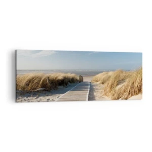 Impression sur toile - Image sur toile - Un chemin en bois mène à travers les dunes jusqu'à la mer calme - 140x50cm - Derrière la dune, dans le bruissement de l'herbe - Décoration murale moderne pour le salon et la chambre ARTTOR