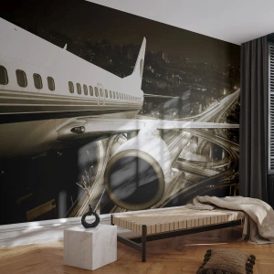 Papier Peint Photo Standard Eco - Un avion au-dessus d'une ville nocturne avec un réseau d'autoroutes - 100x70cm - Vole dans la nuit - Décoration murale moderne pour le salon et la chambre ARTTOR