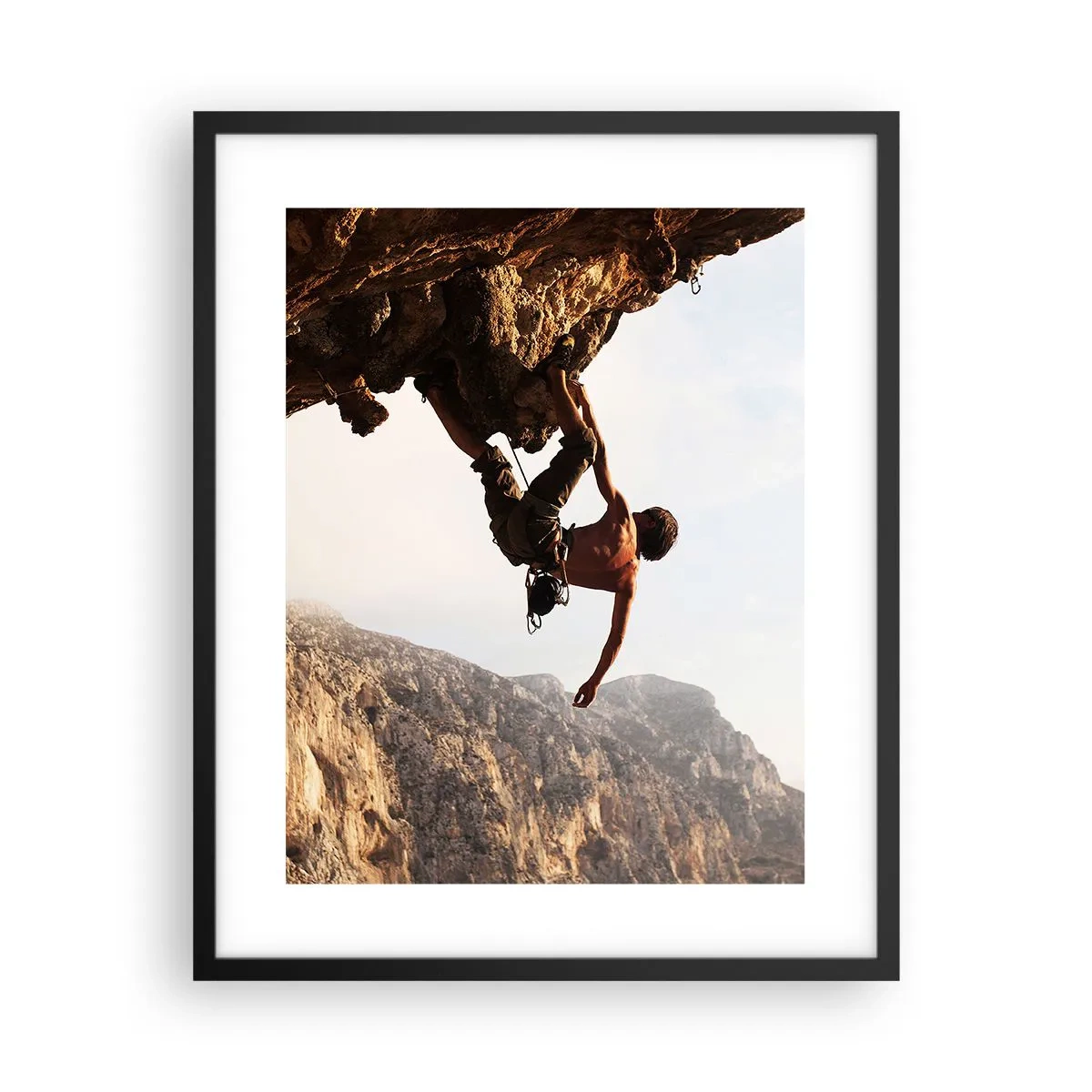 Affiche dans un cadre noir - Poster - Le monde rétréci dans une main sur une coupe de rocher - 40x50 cm