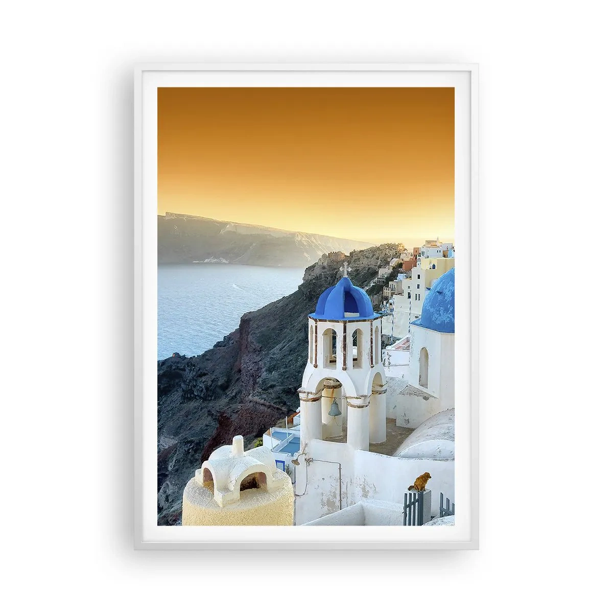 Affiche dans un cadre blanc - Poster - Santorin - blotti contre les rochers - 70x100 cm
