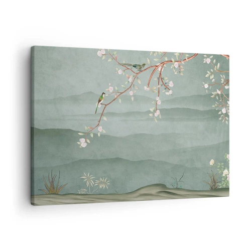 Impression sur toile - Image sur toile - Une image pittoresque d'une branche d'arbre en fleurs avec des oiseaux sur fond de collines verdoyantes. - 70x50cm - Printemps oh c'est toi - Décoration murale moderne pour le salon et la chambre ARTTOR