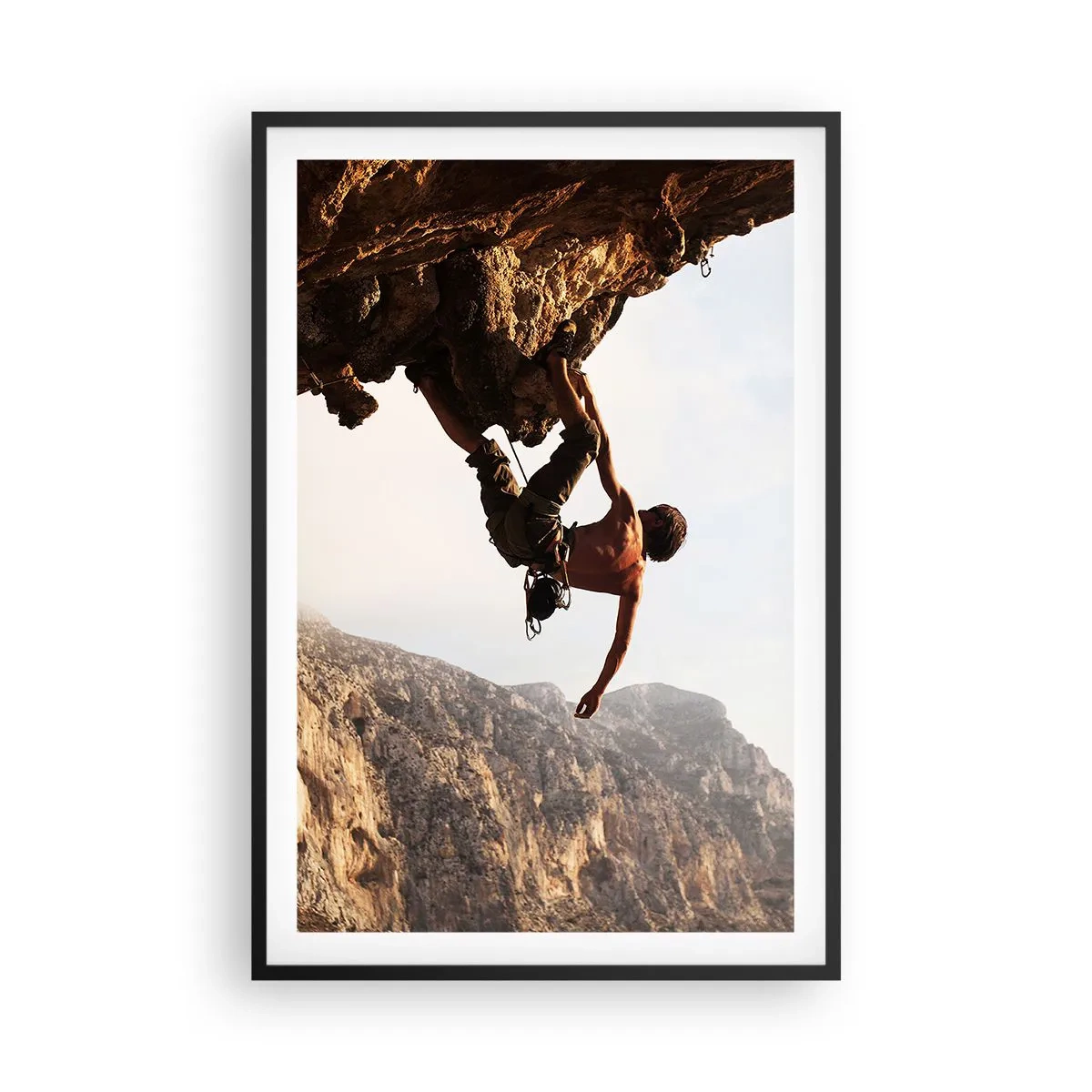 Affiche dans un cadre noir - Poster - Le monde rétréci dans une main sur une coupe de rocher - 61x91 cm