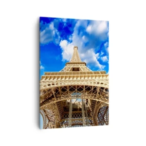 Impression sur toile - Image sur toile - La Tour Eiffel vue d'en bas contre un ciel bleu - 70x100cm - Atteindre le ciel et les nuages - Décoration murale moderne pour le salon et la chambre ARTTOR
