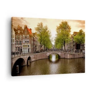 Impression sur toile - Image sur toile - Un canal à Amsterdam entouré d'immeubles historiques - 70x50cm - En bateau ou à vélo ? - Décoration murale moderne pour le salon et la chambre ARTTOR