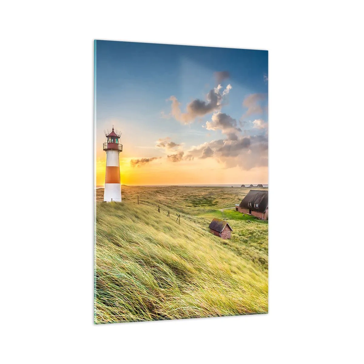 Impression sur verre - Image sur verre - Un phare avec des prairies et des maisons au soleil en arrière-plan - 70x100cm - Entre les vagues - Décoration murale moderne pour le salon et la chambre ARTTOR