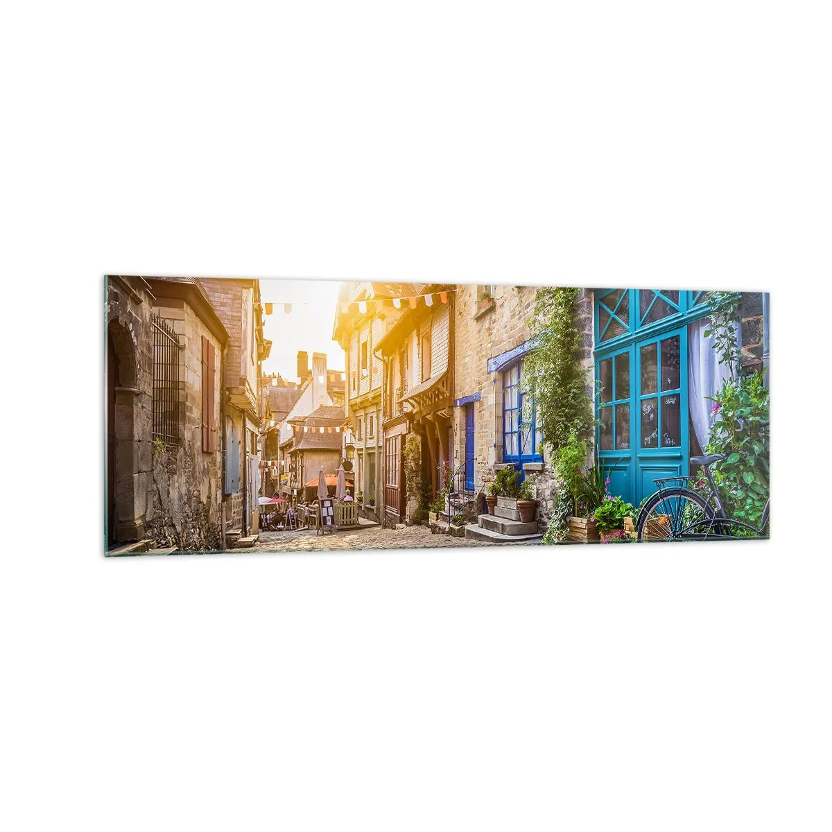 Impression sur verre - Image sur verre - Une charmante rue pavée au soleil - 140x50cm - Aux confins du monde - Décoration murale moderne pour le salon et la chambre ARTTOR