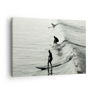 Impression sur toile - Image sur toile - Surfeurs sur les vagues dans une photo monochrome - 70x50cm - A la rencontre de la vague - Décoration murale moderne pour le salon et la chambre ARTTOR