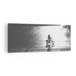 Impression sur toile - Image sur toile - Silhouette noire et blanche d'un cycliste sur une rue mouillée - 120x50cm - Devant moi, à travers la ville - Décoration murale moderne pour le salon et la chambre ARTTOR