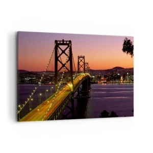 Impression sur toile - Image sur toile - Un pont illuminé la nuit au-dessus de l'eau avec une vue panoramique sur la ville - 100x70cm - Soirée violette - Décoration murale moderne pour le salon et la chambre ARTTOR