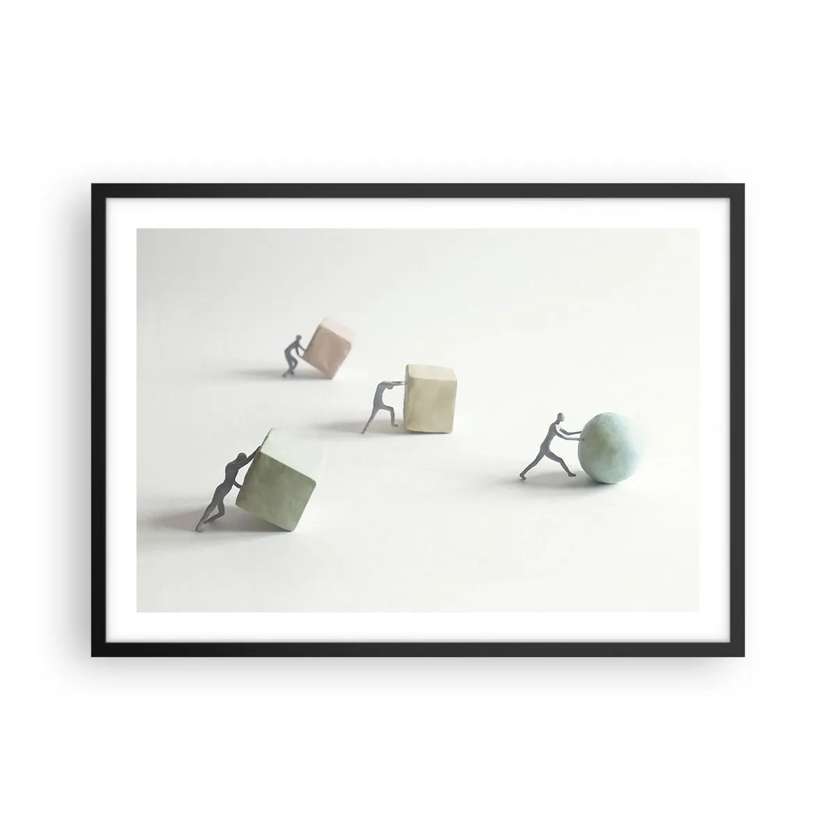Affiche dans un cadre noir - Poster - Figurines miniatures poussant des formes sur un fond clair - 70x50cm - Rien que la vie - Décoration murale moderne pour le salon et la chambre ARTTOR