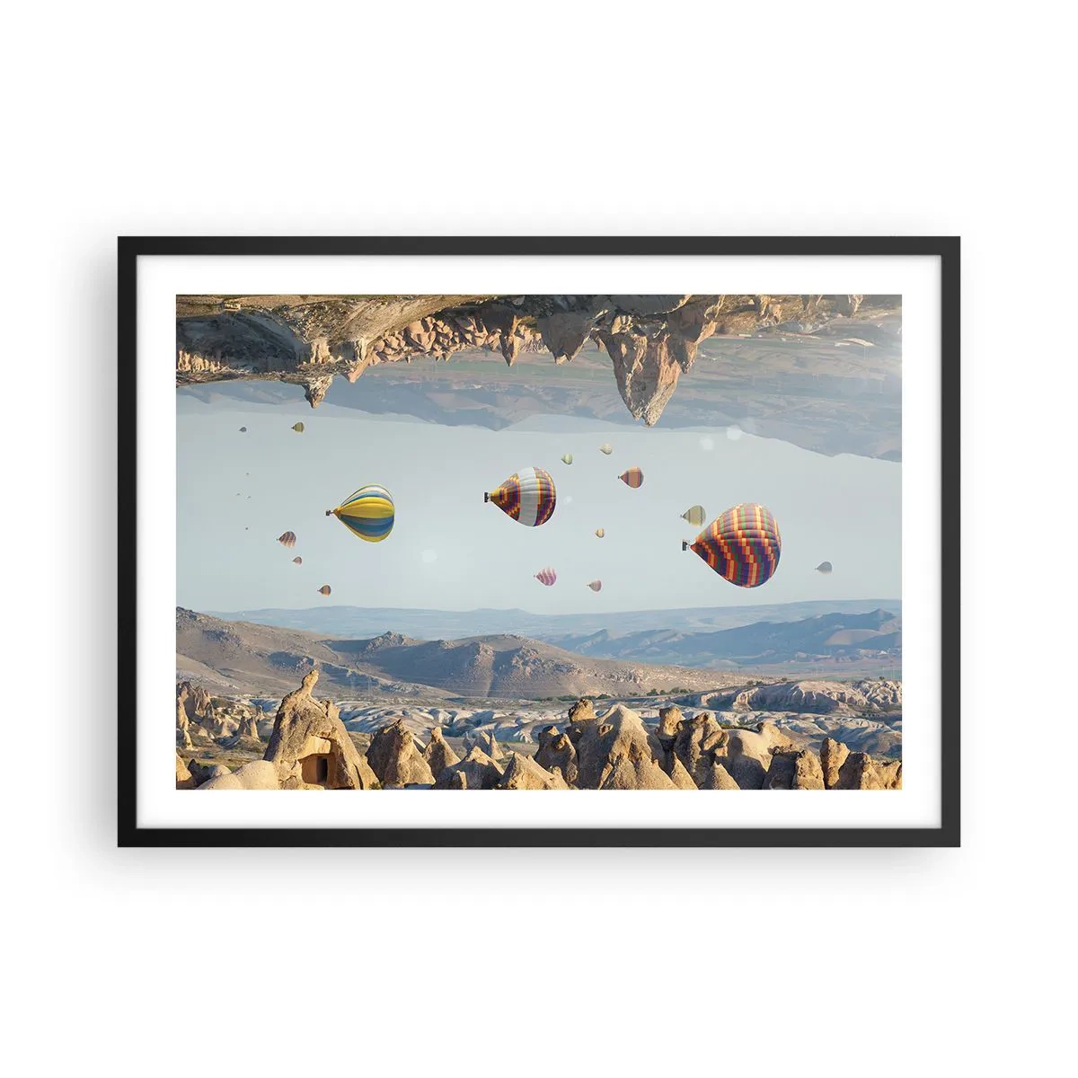 Affiche dans un cadre noir - Poster - Ballons colorés au-dessus d'un paysage rocheux - 70x50cm - Ici, tout est possible - Décoration murale moderne pour le salon et la chambre ARTTOR