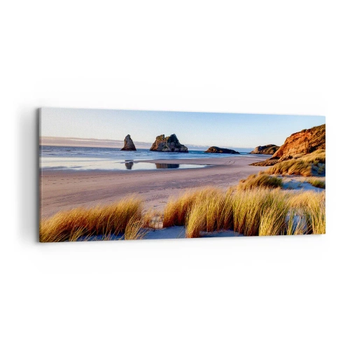 Impression sur toile - Image sur toile - Une plage pittoresque avec vue sur les rochers et la mer au coucher du soleil - 120x50cm - Pour les chercheurs de paix - Décoration murale moderne pour le salon et la chambre ARTTOR