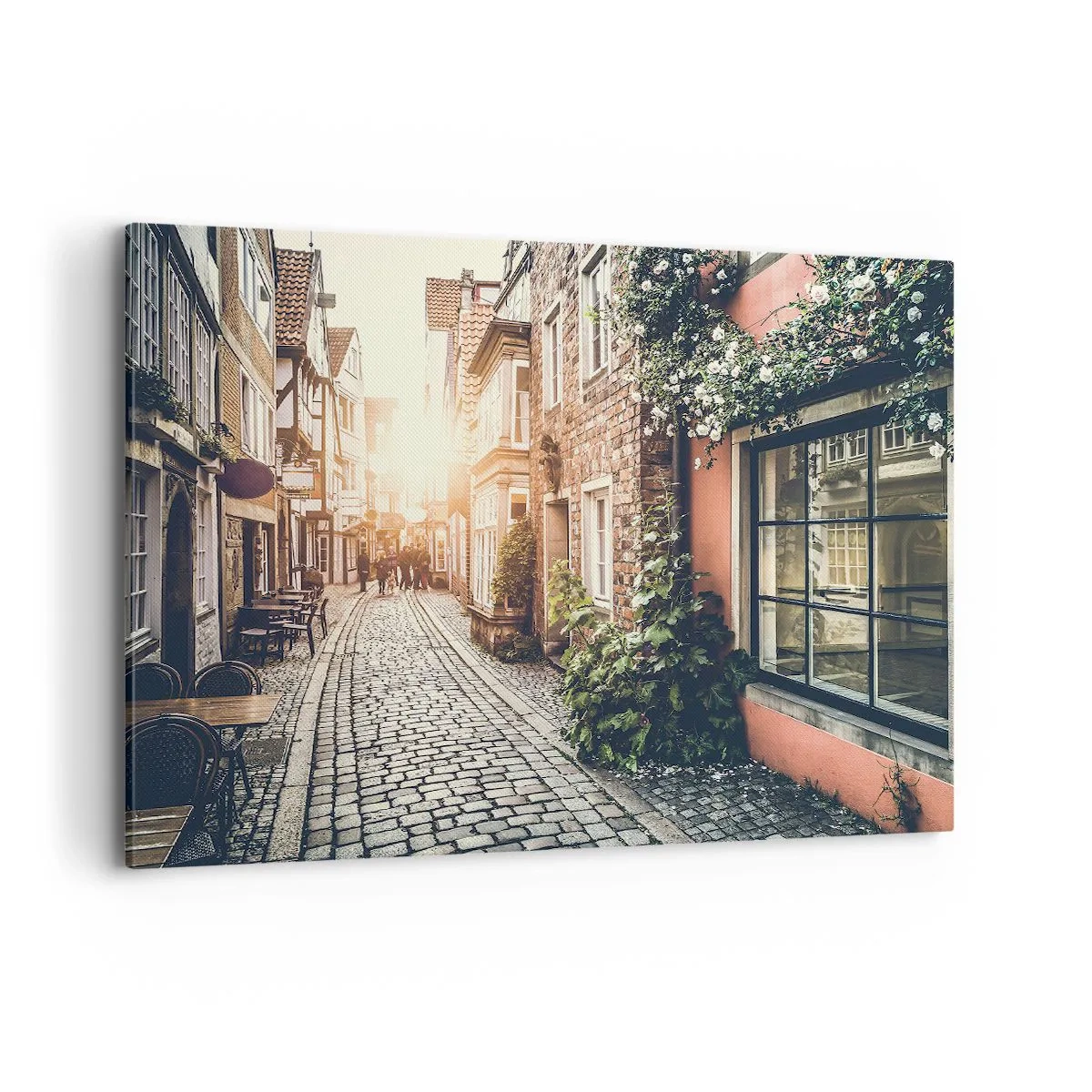 Impression sur toile - Image sur toile - Une charmante rue pavée de pierre et fleurie - 120x80cm - Allée de roses en lueur rose - Décoration murale moderne pour le salon et la chambre ARTTOR