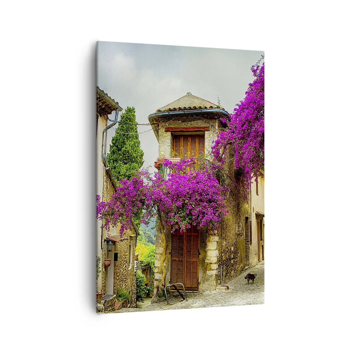 Impression sur toile - Image sur toile - Une rue en pierre avec des fleurs roses et des maisons - 70x100cm - Sous un dais fleuri - Décoration murale moderne pour le salon et la chambre ARTTOR