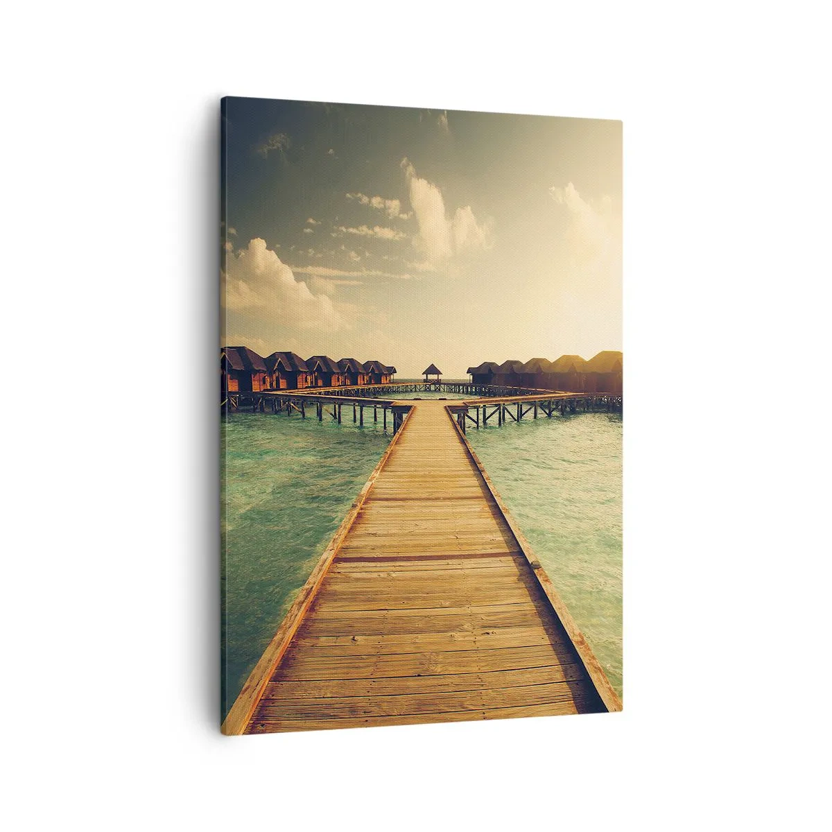 Impression sur toile - Image sur toile - Une jetée en bois menant aux maisons sur l'eau, illuminée par les rayons du soleil. - 50x70cm - Invitation chaleureuse - Décoration murale moderne pour le salon et la chambre ARTTOR