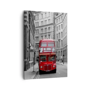 Impression sur toile - Image sur toile - Un bus rouge sur fond de bâtiments urbains noirs et blancs. - 50x70cm - La vie de tous les jours ne doit pas être grise - Décoration murale moderne pour le salon et la chambre ARTTOR