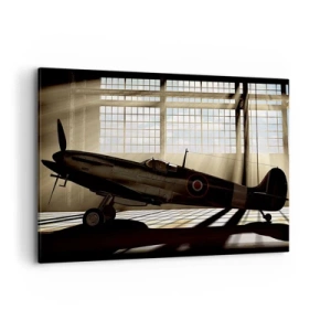 Impression sur toile - Image sur toile - Un avion historique dans un hangar éclairé par la lumière du soleil - 100x70cm - Le repos du guerrier - Décoration murale moderne pour le salon et la chambre ARTTOR