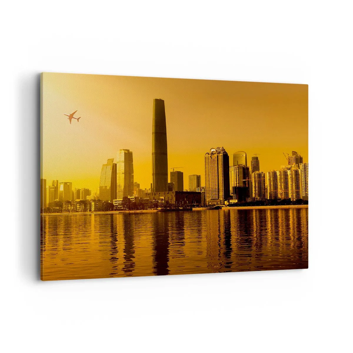 Impression sur toile - Image sur toile - Panorama de la ville au coucher du soleil avec des gratte-ciels et un avion - 100x70cm - La ville en or - Décoration murale moderne pour le salon et la chambre ARTTOR