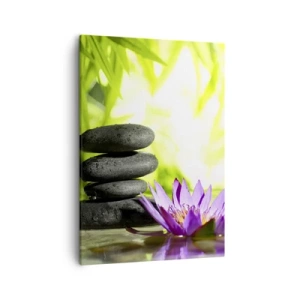 Impression sur toile - Image sur toile - Une pile de pierres zen et une fleur de lotus sur un fond de feuilles de bambou. - 50x70cm - Dans un buisson de bambou - Décoration murale moderne pour le salon et la chambre ARTTOR