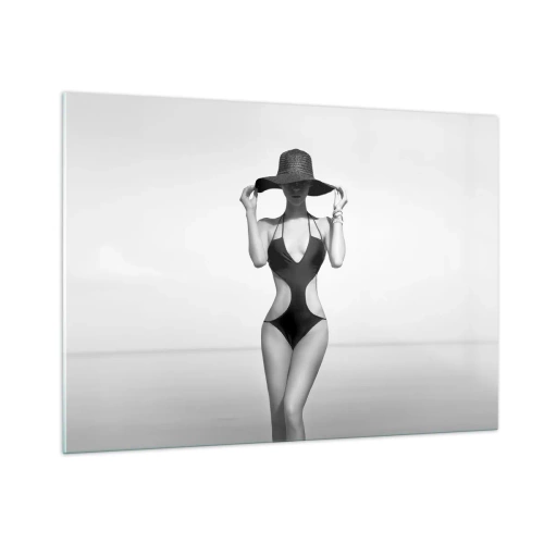 Impression sur verre - Image sur verre - Une femme en maillot de bain noir et chapeau contre la mer - 100x70cm - Mon prénom? Élégance - Décoration murale moderne pour le salon et la chambre ARTTOR