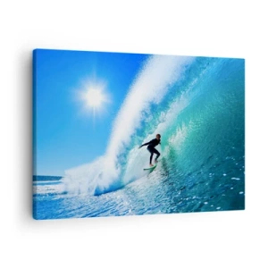 Impression sur toile - Image sur toile - Un surfeur sur une planche chevauche une vague puissante sous un ciel bleu. - 70x50cm - A travers le grand ciel bleu - Décoration murale moderne pour le salon et la chambre ARTTOR