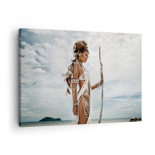 Impression sur toile - Image sur toile - Femme stylisée sur la plage avec des ornements ethniques et un bâton - 70x50cm - Reine des tropiques - Décoration murale moderne pour le salon et la chambre ARTTOR
