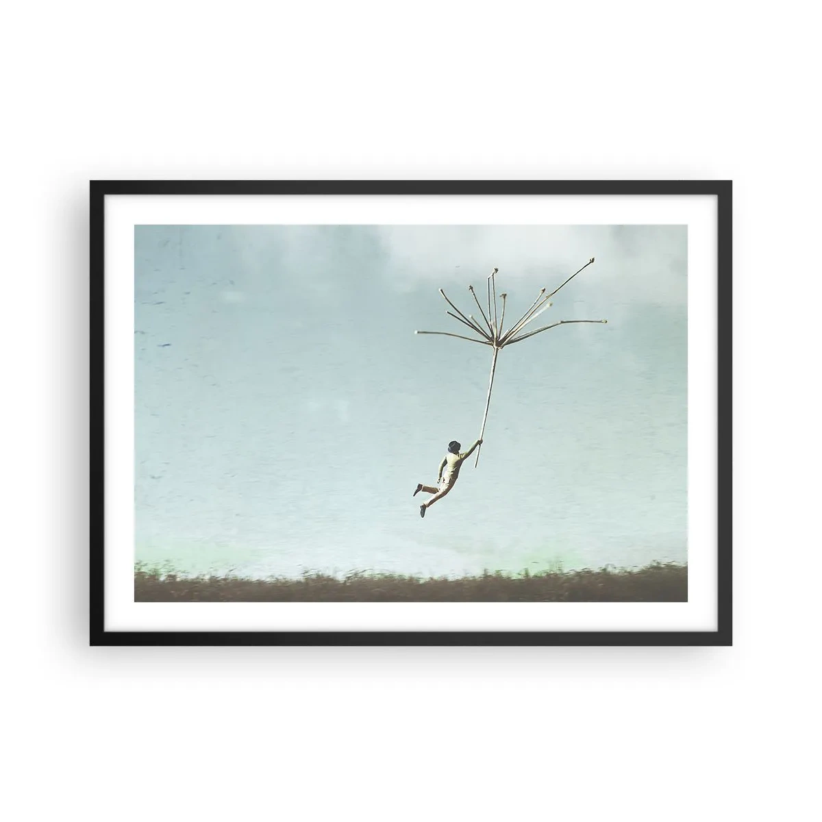 Affiche dans un cadre noir - Poster - Une silhouette soulevée par une grosse graine de pissenlit - 70x50cm - Cerfs-volants, pissenlits, vent - Décoration murale moderne pour le salon et la chambre ARTTOR